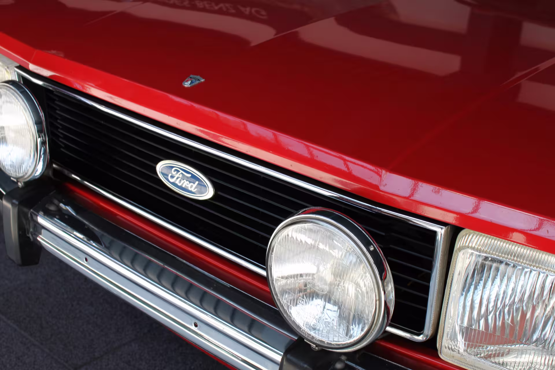 Technician mixing automotive paint